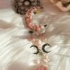 Decorative moon wind chime with pink natural stones