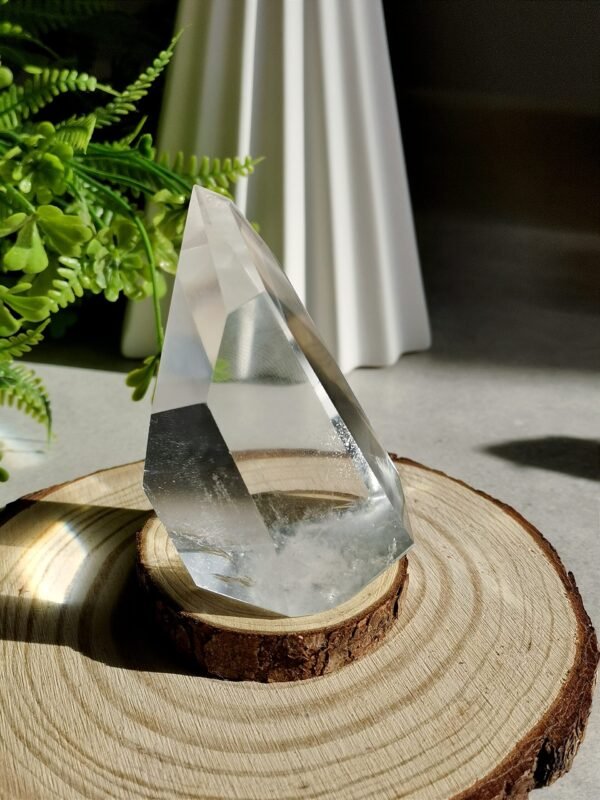 Clear quartz crystal point with phantom