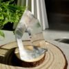 Clear quartz crystal point with phantom