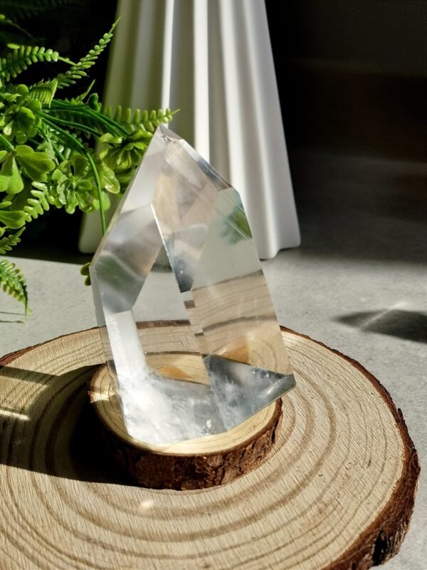 Clear quartz crystal point with phantom