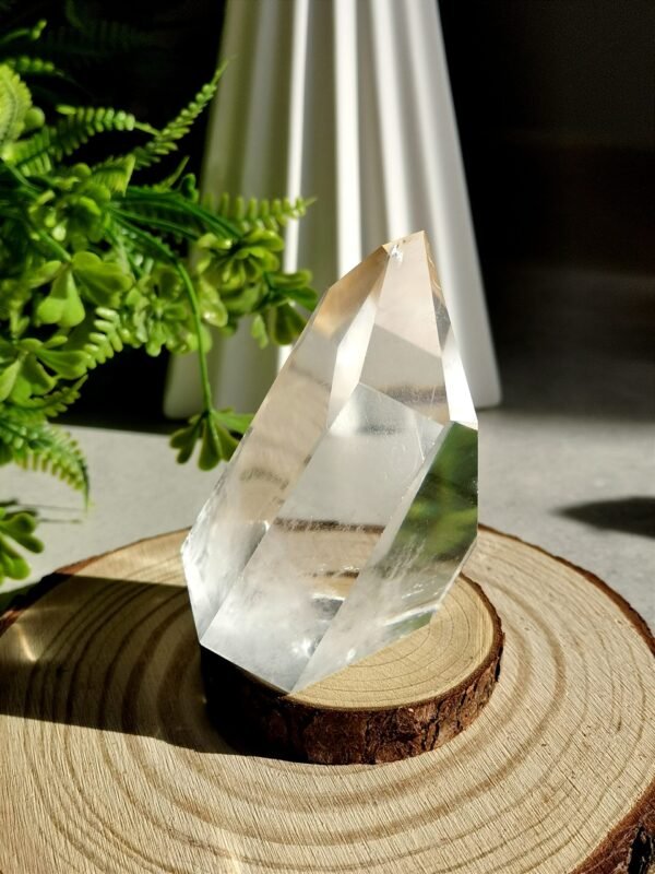 Clear quartz crystal point with phantom