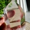 Clear quartz crystal point with phantom