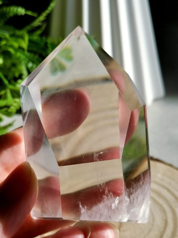 Clear quartz crystal point with phantom