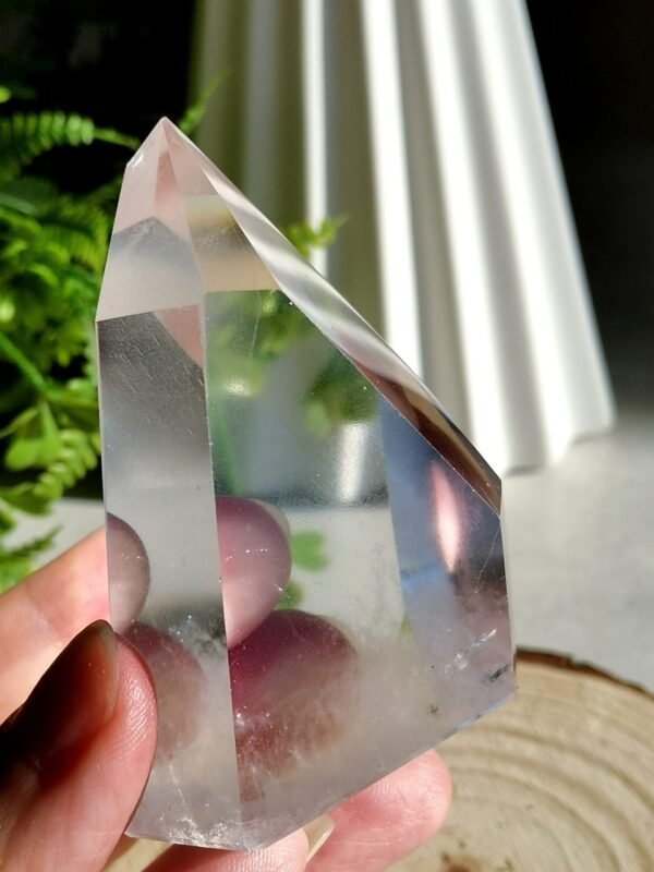 Clear quartz crystal point with phantom