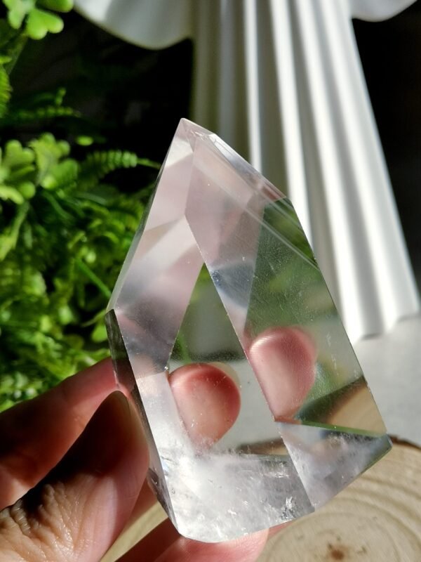 Clear quartz crystal point with phantom