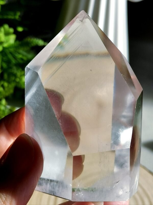 Clear quartz crystal point with phantom