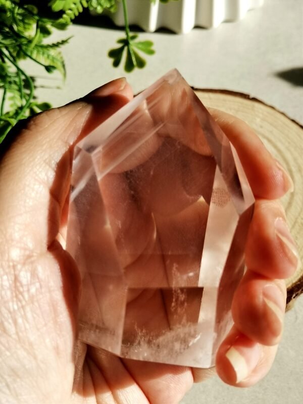 Clear quartz crystal point with phantom