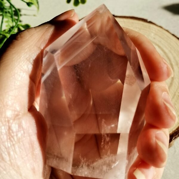 Clear quartz crystal point with phantom