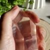 Clear quartz crystal point with phantom