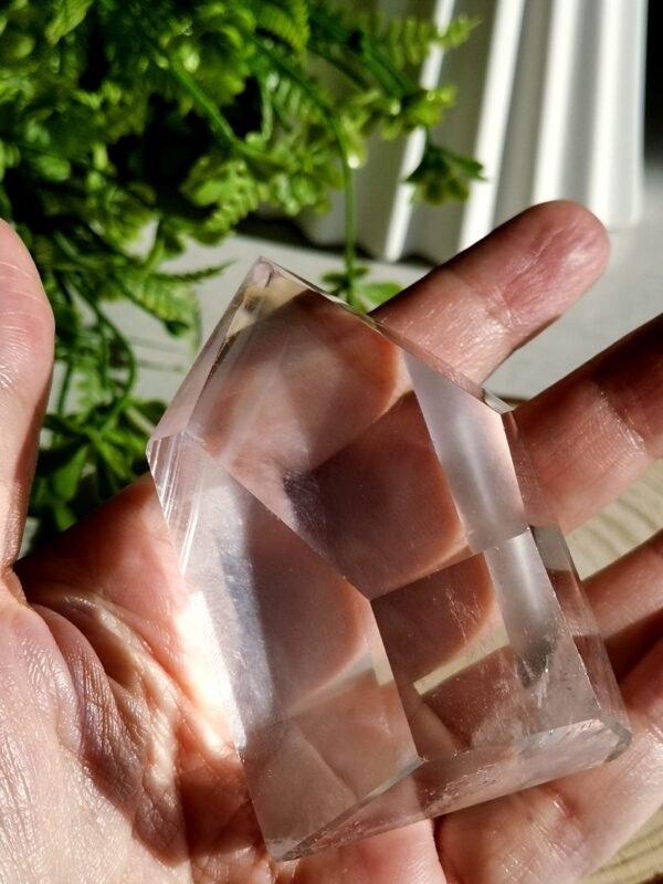 Clear quartz crystal point with phantom