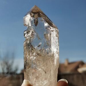 Clear quartz with inclusions and a rainbow effect