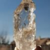 Clear quartz with inclusions and a rainbow effect
