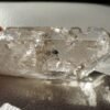 Clear quartz with inclusions and a rainbow effect