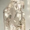Clear quartz with inclusions and a rainbow effect