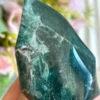 Punta en forma de llama · verde oscura