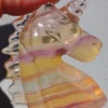 1775492297.webp Unicornio de fluorita multicolor