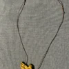 Colgante águila en ojo de tigre