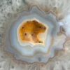 Natural white agate with yellow crystalline cavity