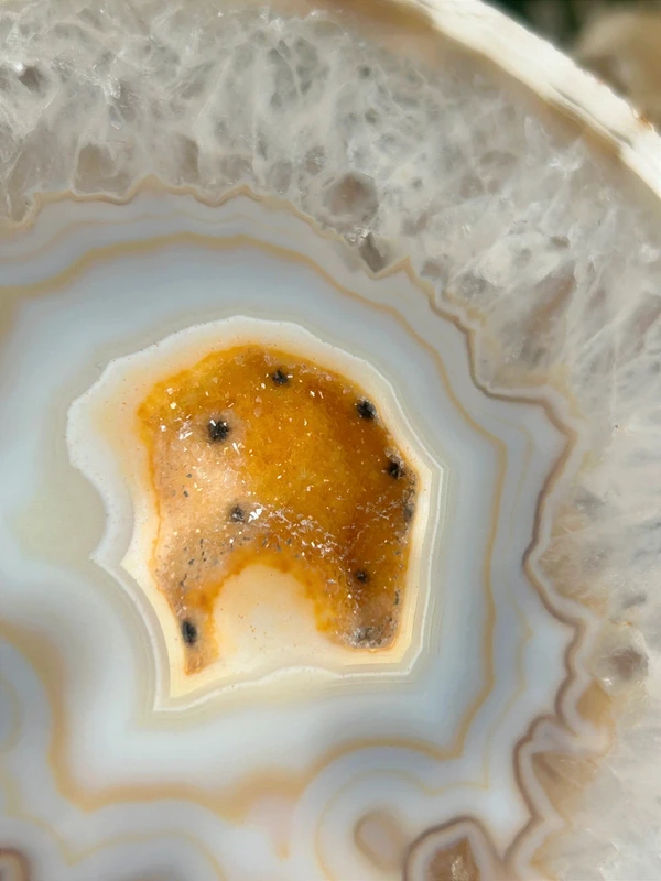 Natural white agate with yellow crystalline cavity
