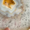 Natural white agate with yellow crystalline cavity