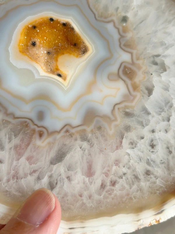 Natural white agate with yellow crystalline cavity