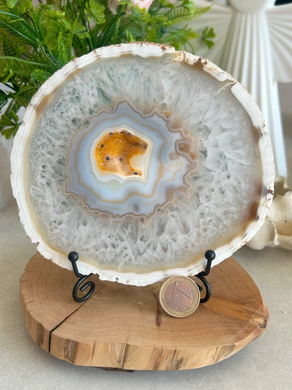 Natural white agate with yellow crystalline cavity