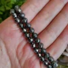 1775922318-1.webp Faceted hematite bracelet • natural