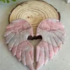 1776171841-4.webp Corazón alado tallado en ópalo rosa