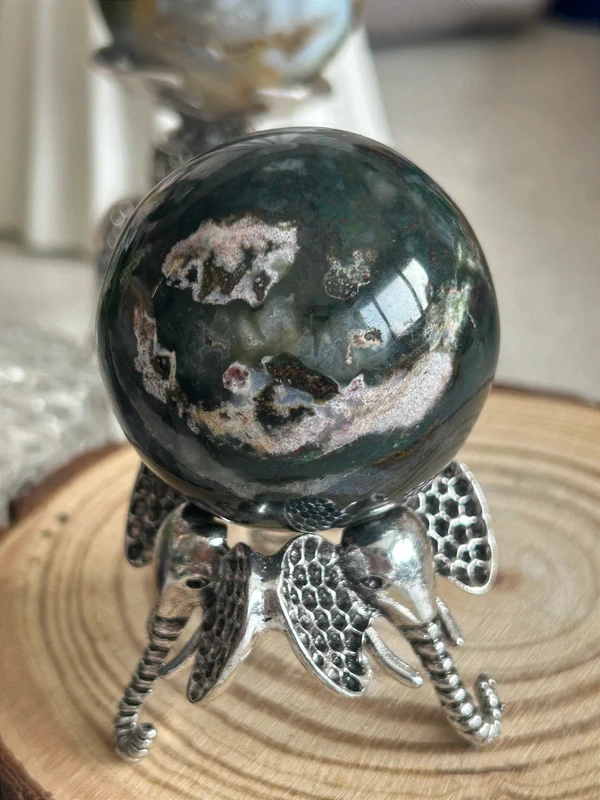 Natural agate sphere deep green