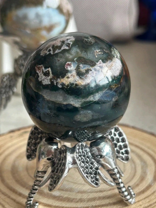 Natural agate sphere deep green