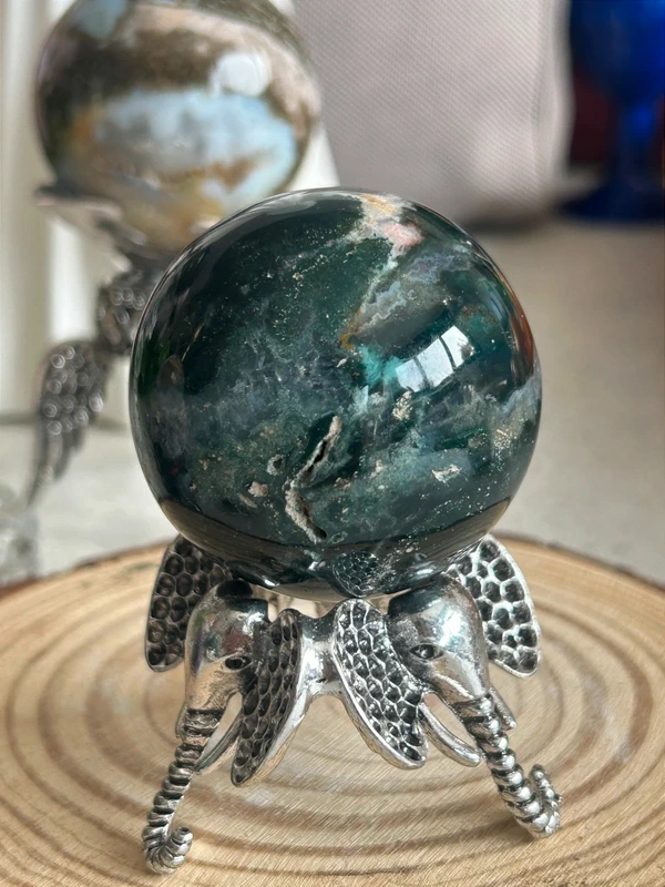 Natural agate sphere deep green