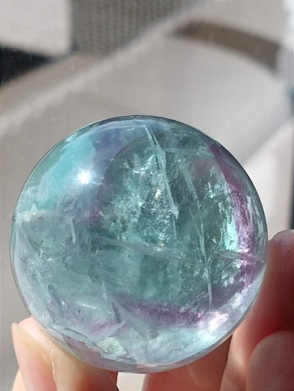 1777133687-1.webp Mint green fluorite sphere • Crystal