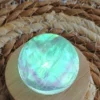 1777133687-2.webp Mint green fluorite sphere • Crystal