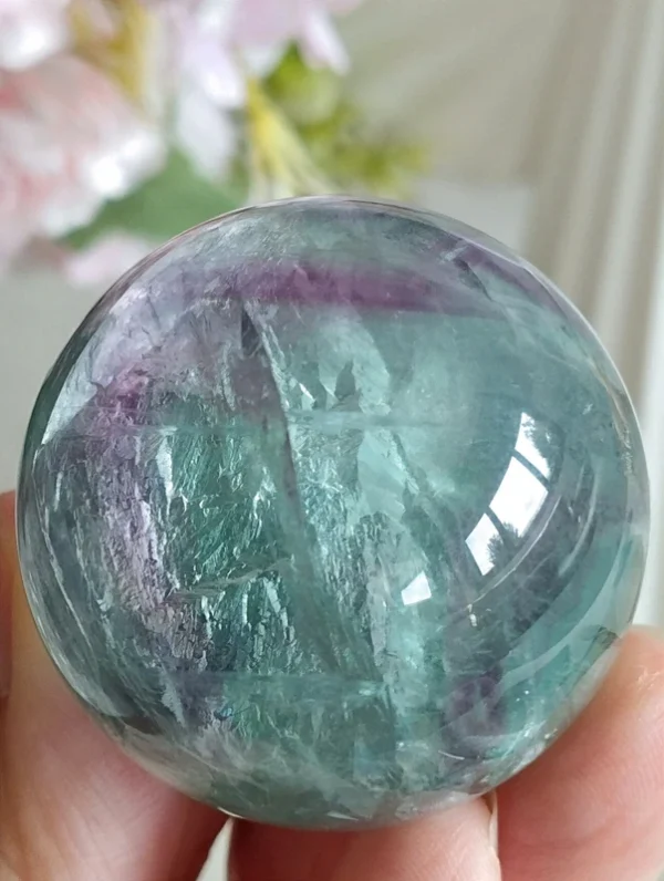 1777133687-4.webp Mint green fluorite sphere • Crystal