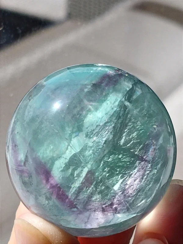 1777133687.webp Mint green fluorite sphere • Crystal