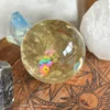 Yellow quartz sphere in crystal