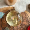 Yellow quartz sphere in crystal
