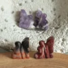 Small winged fairies in natural stone