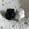Owls in Obsidian and Howlite. Natural