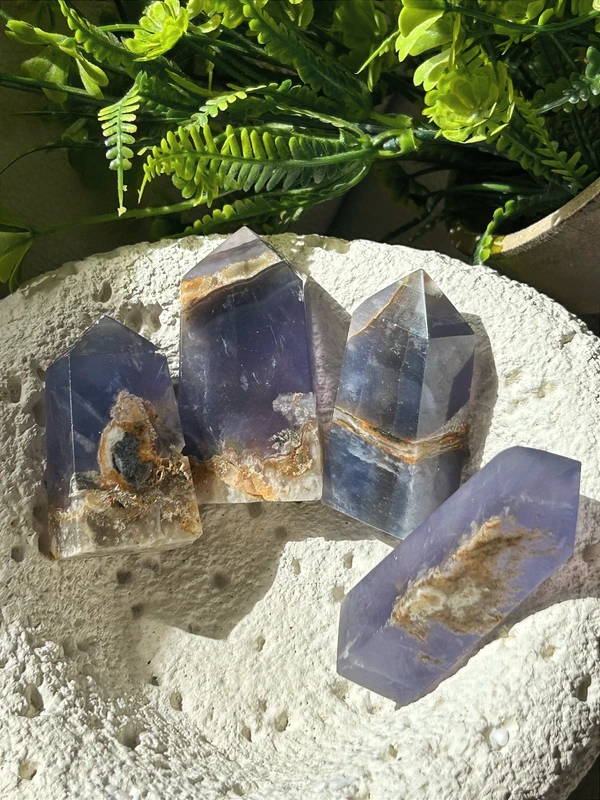 Translucent violet fluorite tower • crystal