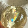 Yellow quartz sphere in crystal