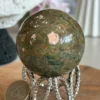 Rainforest jasper sphere 🌿 multicolored eye-like pattern