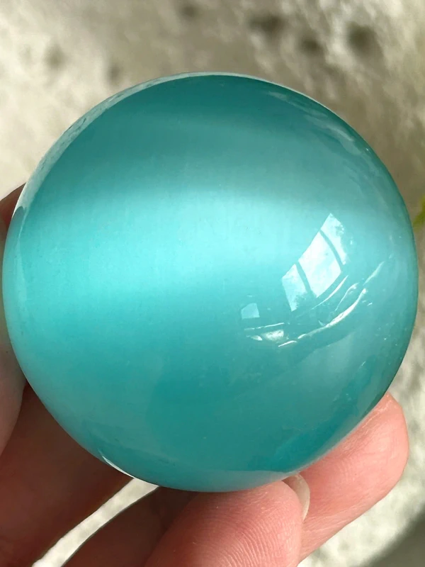 Esfera ojo de gato azul hielo