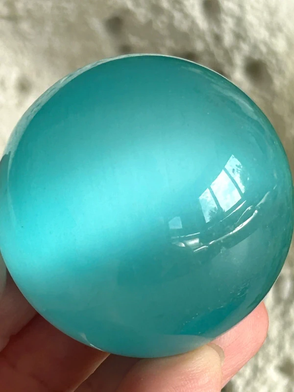Esfera ojo de gato azul hielo