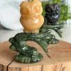 Owl on a branch • natural yellow calcite