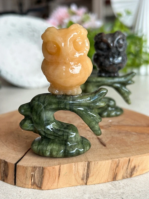 Owl on a branch • natural yellow calcite