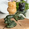 Owl on a branch • natural yellow calcite