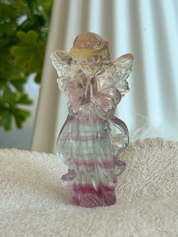 Natural winged angel rainbow fluorite · per unit
