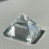 Clear quartz/obsidian pyramids. • Set for energy disposition