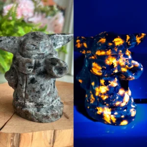 1780187787.webp Figura de Sabio Anciano tallada en piedra de fuego natural